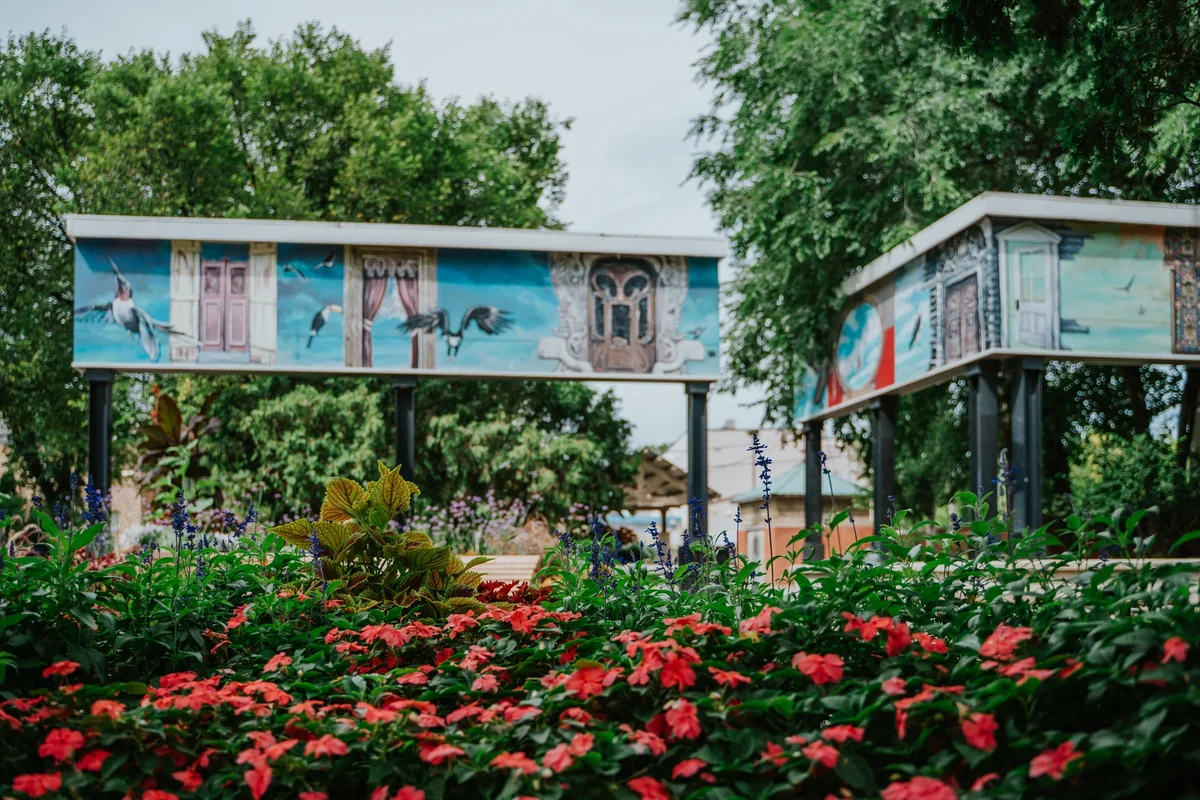 Flowers and public art in a Corydon Avenue garden